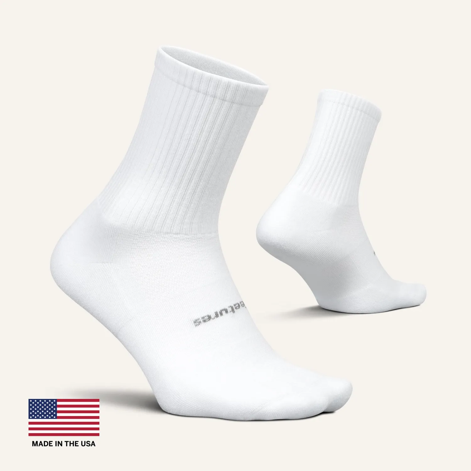 Feetures High Performance Max Cushion Quarter Tall sokk White myk