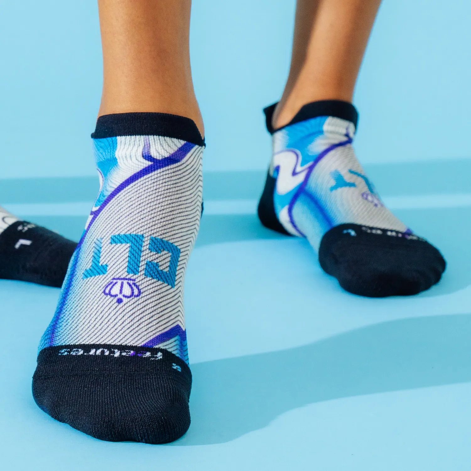 Feetures Elite Light Cushion Tab sokker NYC 26 tynn