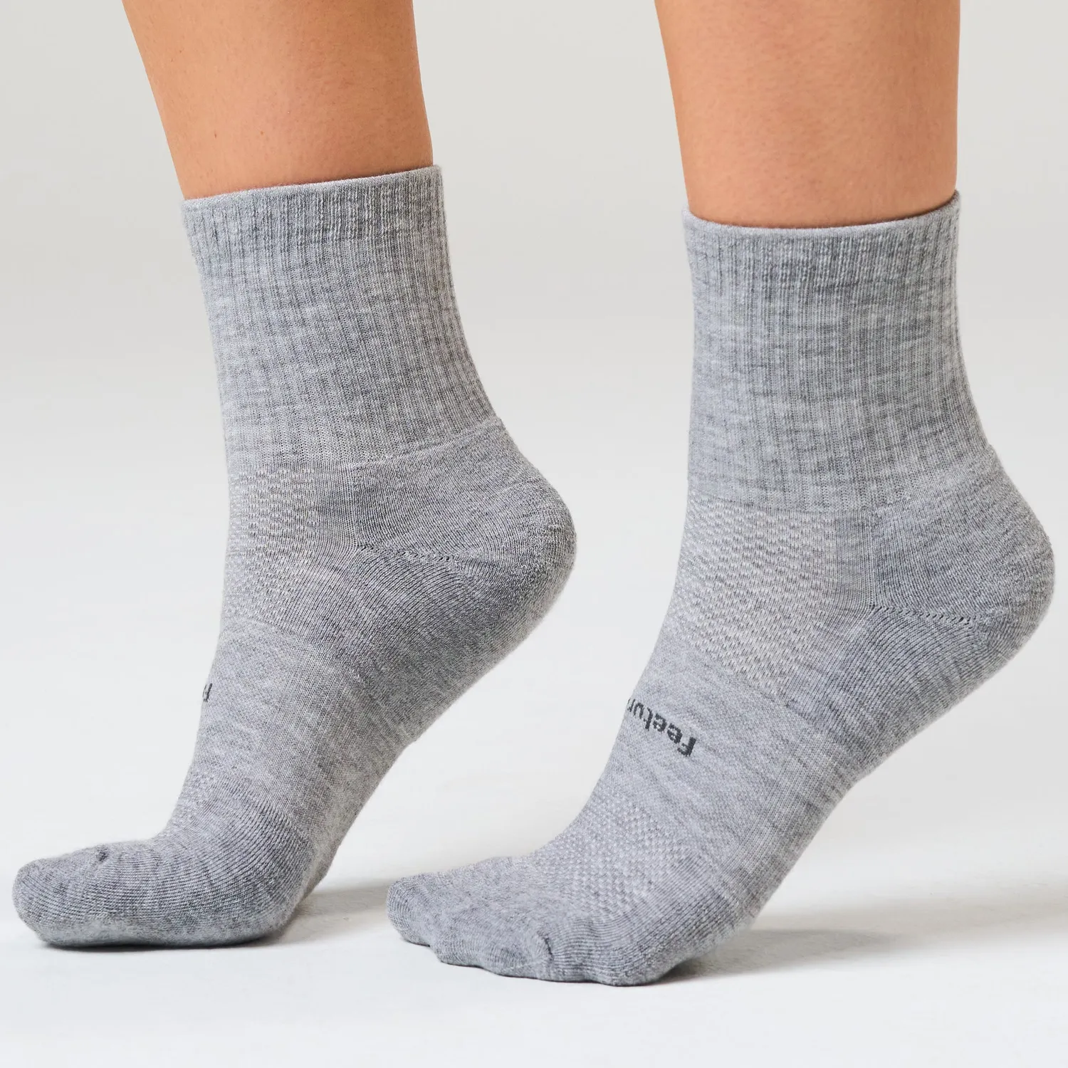 Feetures High Performance Max Cushion Quarter Tall sokk White myk