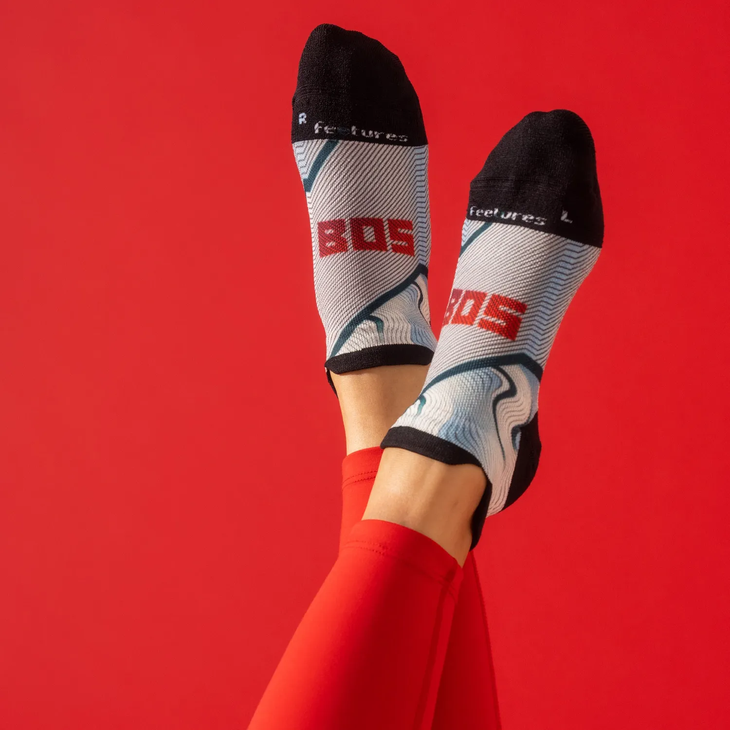 Feetures Elite Light Cushion Tab sokker Boston 26 lett demping